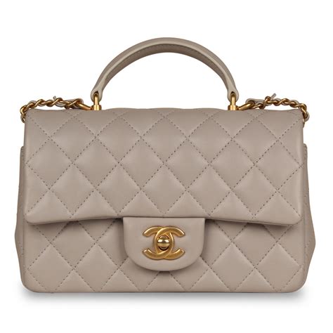 chanel small single flap price|Chanel mini flap bag with top handle.